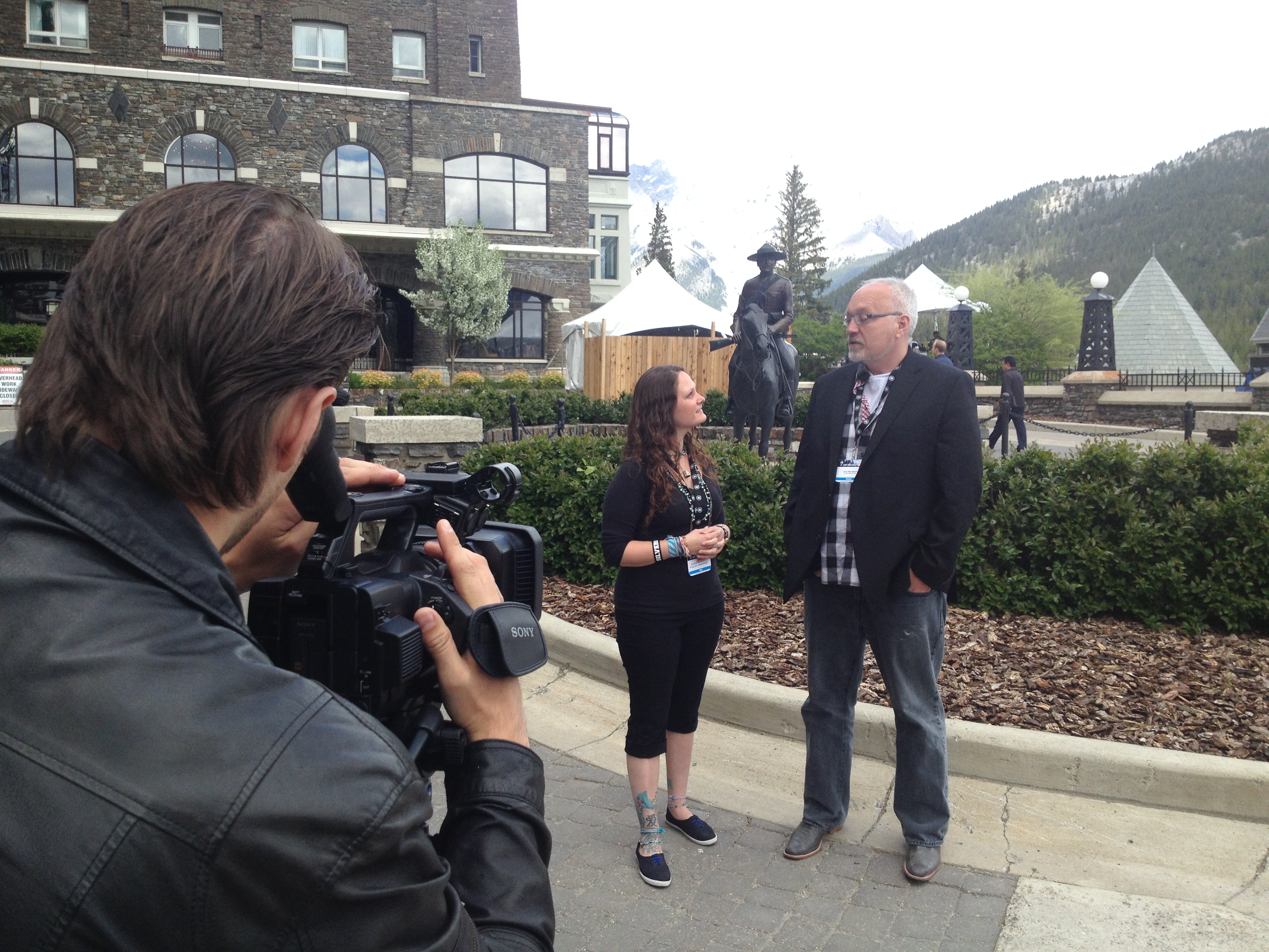 Melissa Henderson discussing Saskatchewan productions with Creative Saskatchewan CEO JP Ellson (Also pictured, Ryan Boyko as Camera Operator)